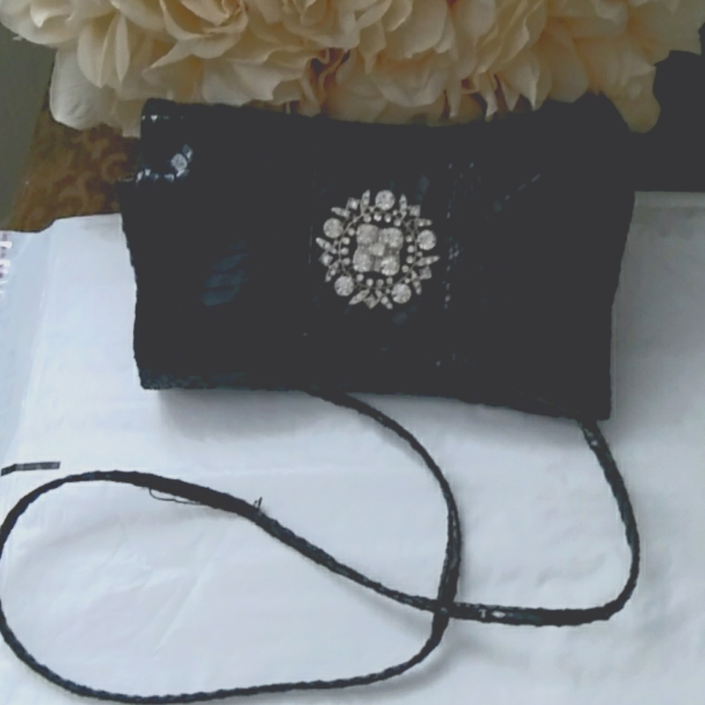 Price is firm Classic Iman Evening Purse.Final Price